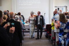 028 - Janet & Pete Walking Down Isle Married