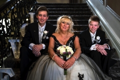 Elizabeth and boys on stairs 1