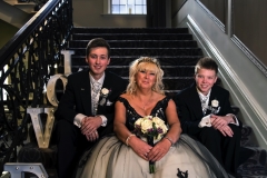 Elizabeth and boys on stairs 2